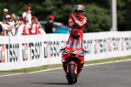 Ducati Lenovo Team's Marc Marquez celebrates after winning the Czech Republic MotoGP race at Masaryk Circuit, Brno, Czech Republic on Sunday