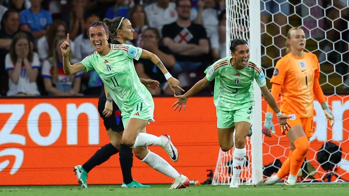 Barbara Bonansea (No.1) celebrates with Lucia Di Guglielmo after scoring.