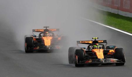 McLaren's Lando Norris and Oscar Piastri in action at the Belgian GP