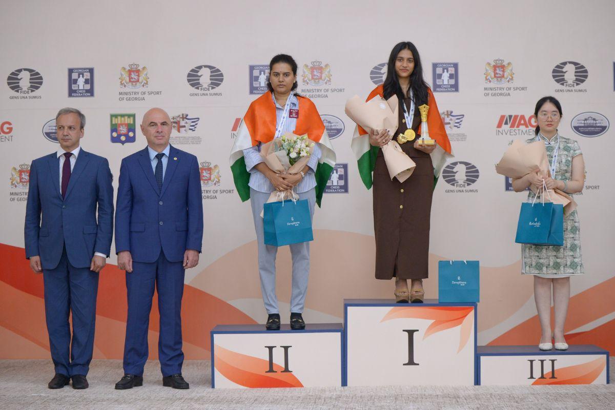 India's Divya Deshmukh atop the podium after winning the FIDE Women’s World Cup 2025 in Batumi, Georgia, on Monday