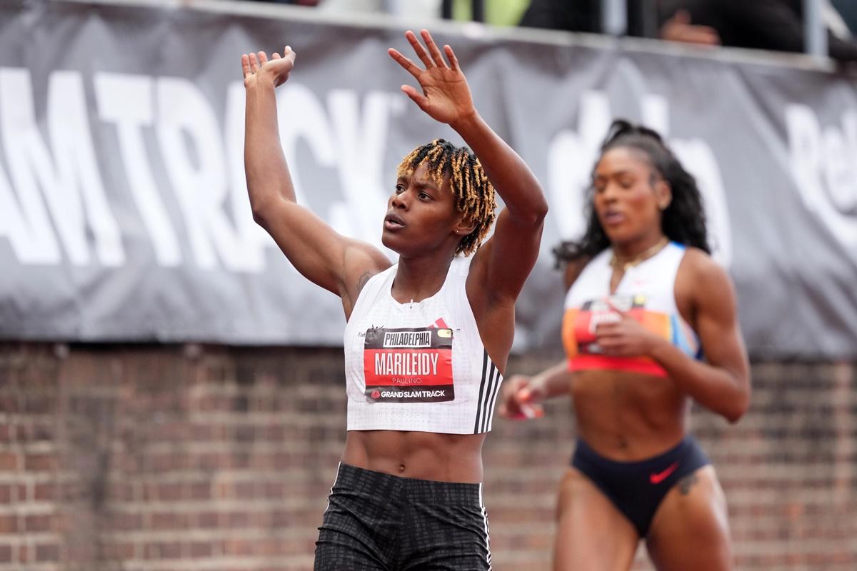 The Dominican Republic's Marileidy Paulino celebrates winning the women's 400m.