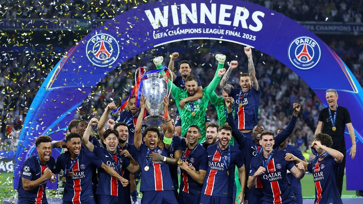 Paris St Germain's players celebrate with the trophy after beating Inter Milan in the UEFA Champions League final, at Allianz Arena, Munich, Germany, on Saturday.
