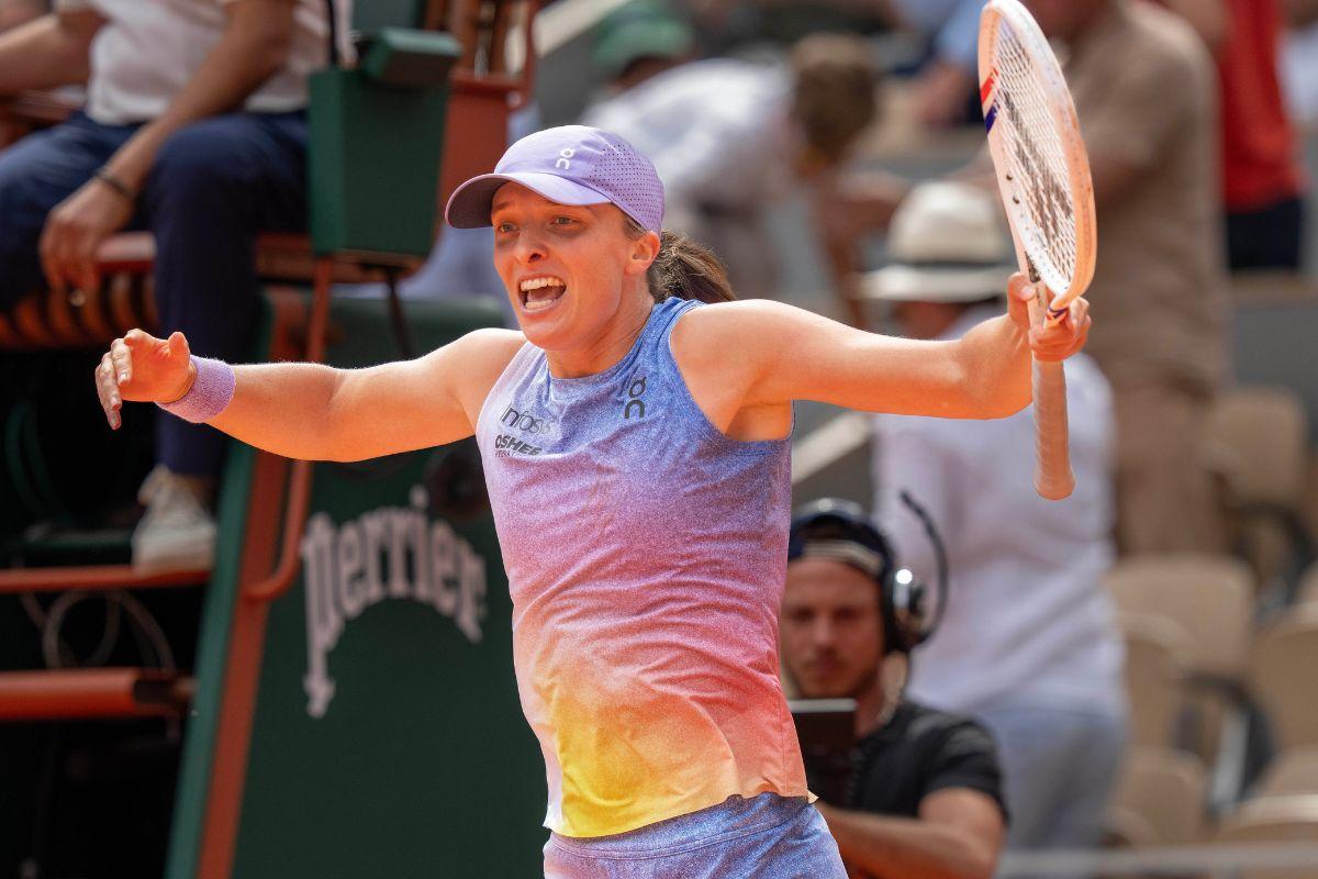 Poland's Iga Swiatek celebrates winning her match against Elena Rybakina of Kazakhstan at the French Open at Roland Garros in Paris on Sunday
