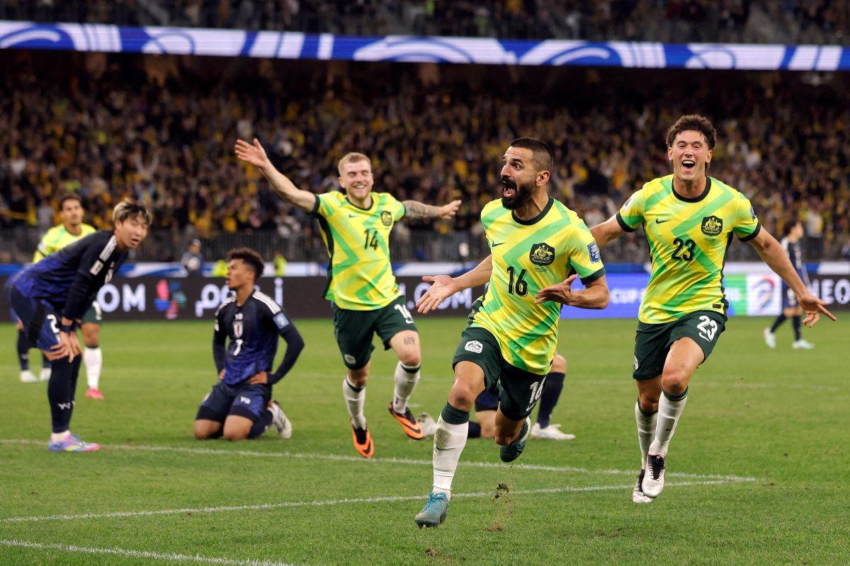 Australia's Aziz Behich celebrates after scoring against Japan in the AFC Qualifiers Group C match at Perth Stadium, Perth on Thursday