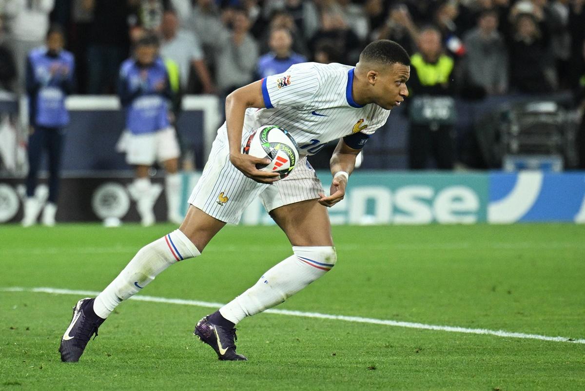 Kylian Mbappe celebrates scoring France's first goal.