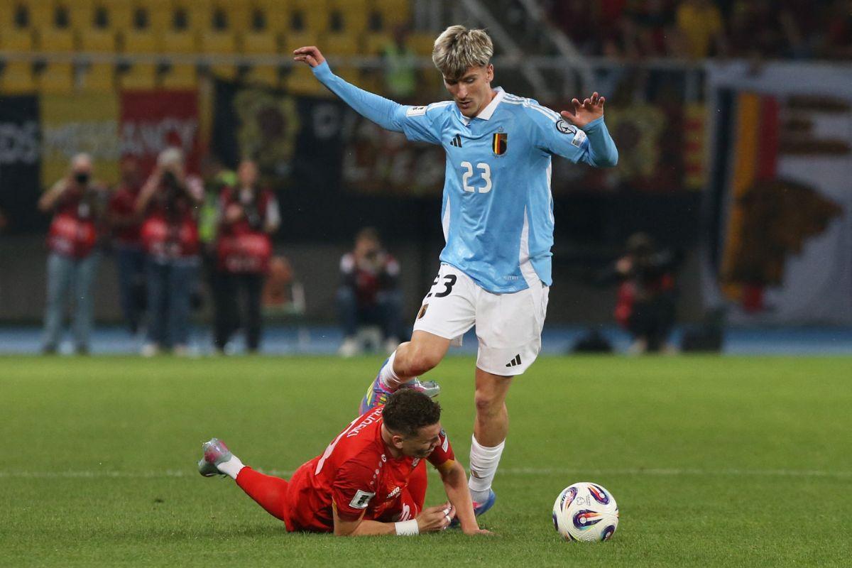 Belgium's Alexis Saelemaekers in action with North Macedonia's Ezgjan Alioski