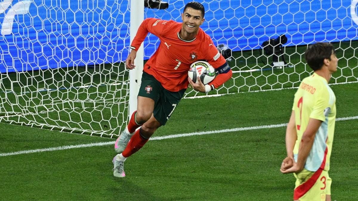 Cristiano Ronaldo celebrates scoring Portugal's second goal and making it 2-2