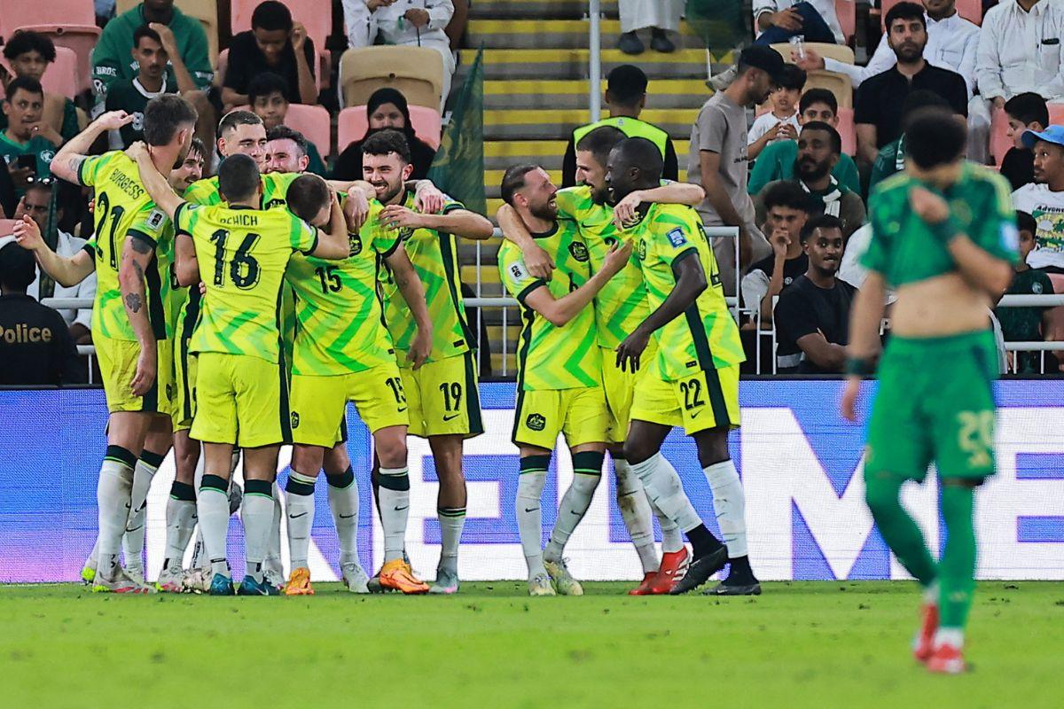 Australia's Mitchell Duke celebrates scoring their second goal with teammates against Saudi Arabia at King Abdullah Sports City Stadium, Jeddah, Saudi Arabia, on Tuesday