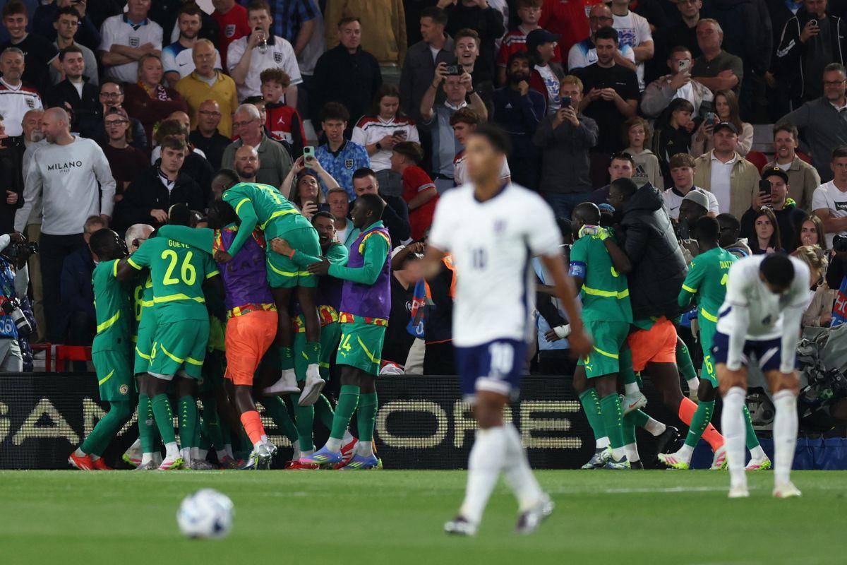 Senegal's Cheikh Sabaly celebrates scoring their third goal with teammates 