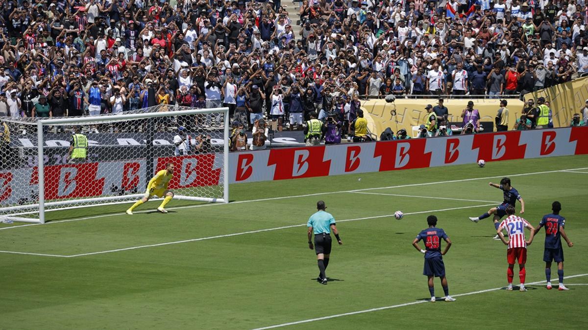 Kang-In Lee scores Paris St Germain's fourth goal from the penalty spot.