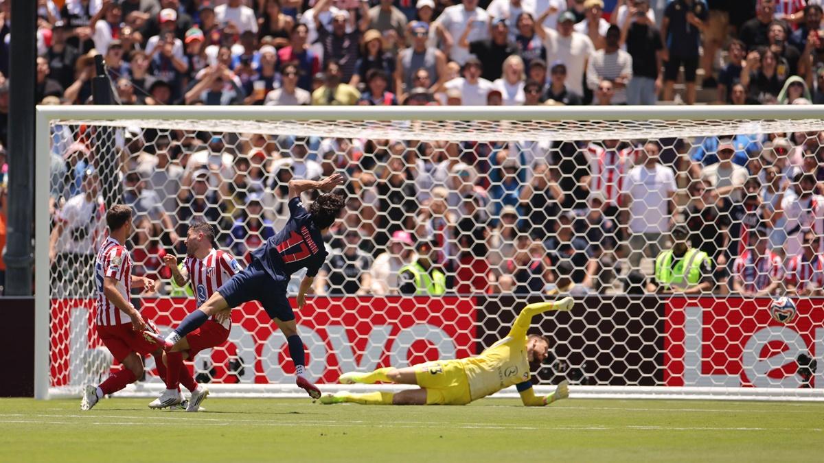Vitinha scores Paris St Germain's second goal past Atletico Madrid's Jan Oblak.