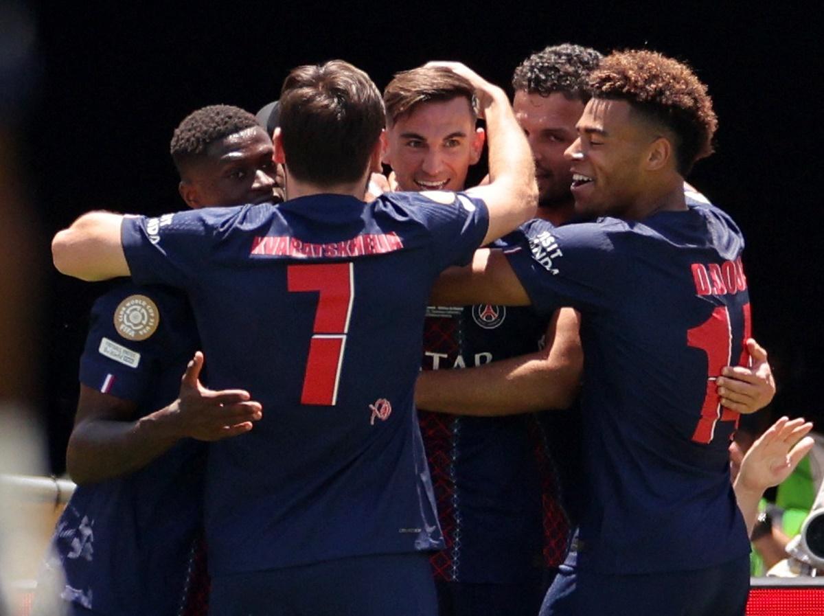 Fabian Ruiz celebrates with Nuno Mendes, Khvicha Kvaratskhelia, Desire Doue and Goncalo Ramos after scoring Paris St Germain's first goal.
