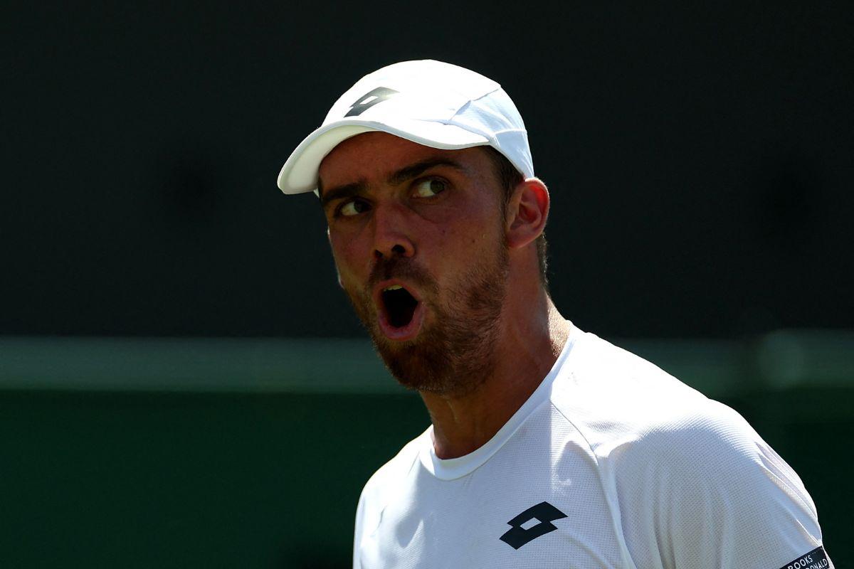 France's Benjamin Bonzi reacts during his first round match against Russia's Daniil Medvedev