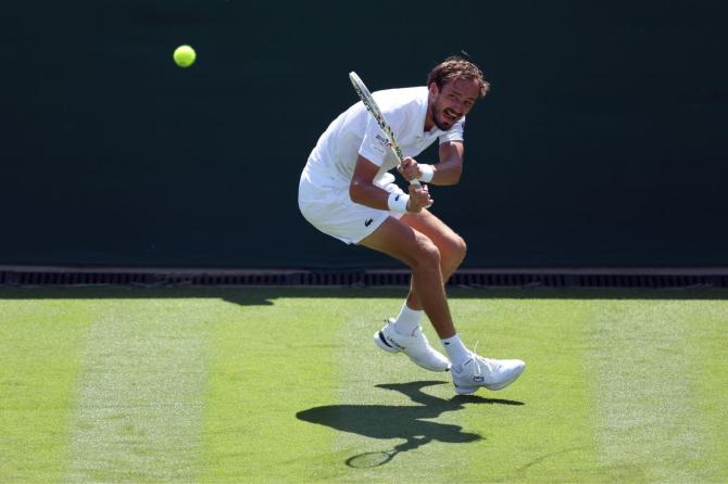 Russia's Daniil Medvedev in action during his Wimbledon first round match against France's Benjamin Bonzi at the All England Lawn Tennis and Croquet Club, Londo, on Monday