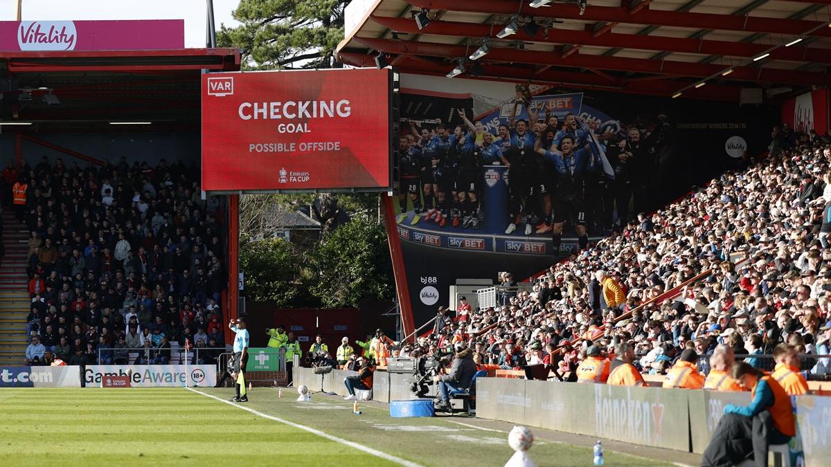 A big screen displays a VAR review message during the FA Cup fifth round match between AFC Bournemouth and Wolverhampton Wanderers at Vitality Stadium, Bournemouth, on Saturday.