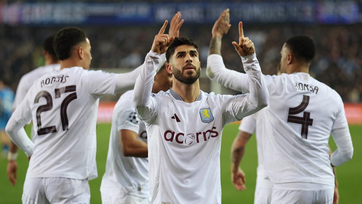 Marco Asensio celebrates with his Aston Villa teammates after scoring.