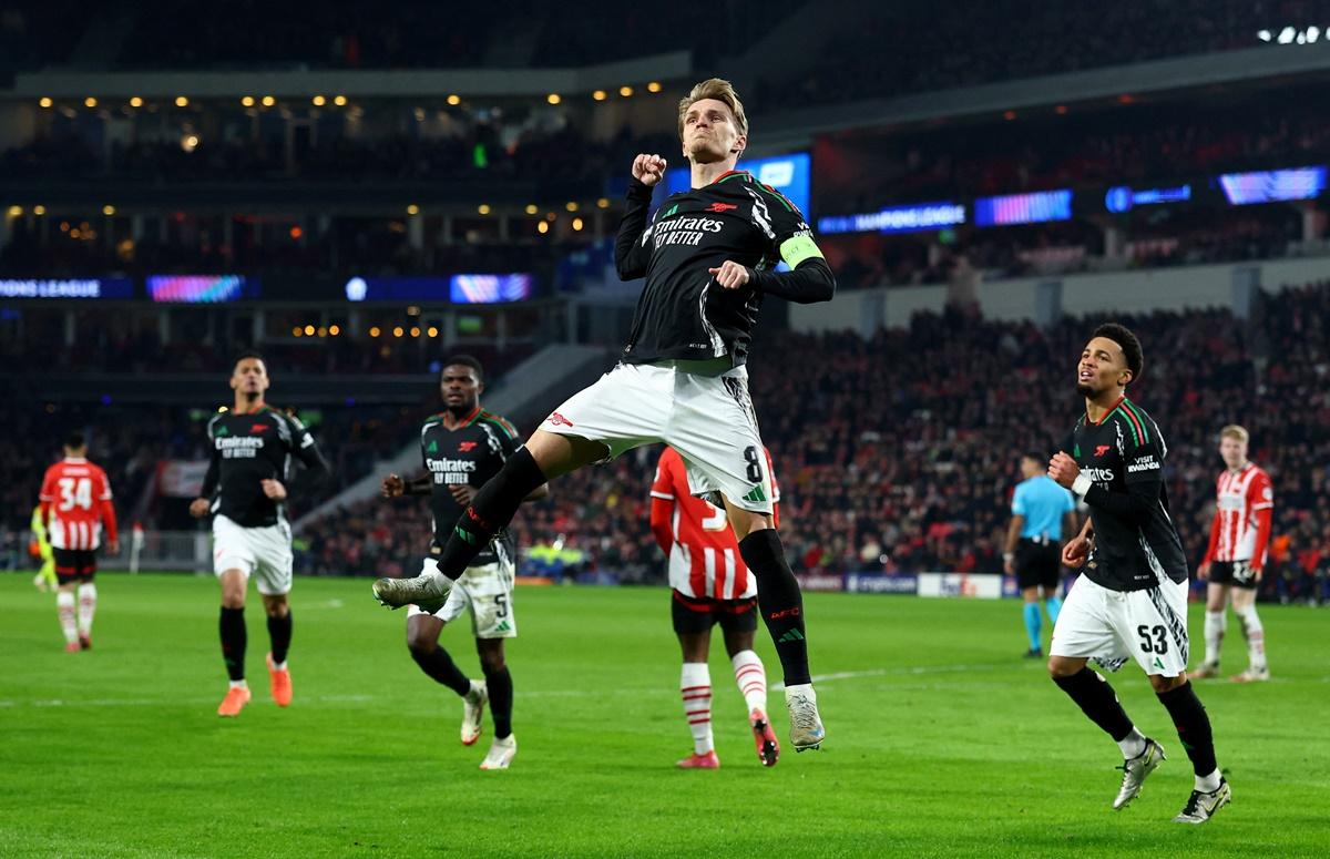 Martin Odegaard celebrates scoring Arsenal's fourth goal.