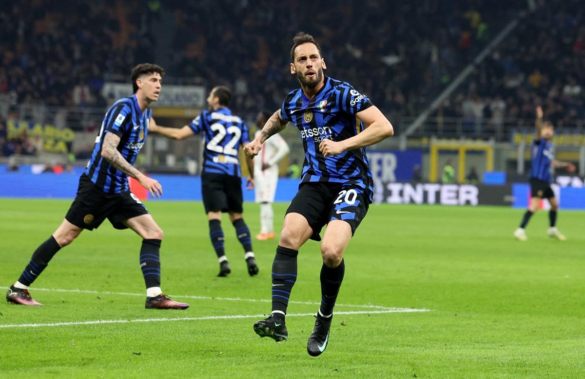 Hakan Calhanoglu celebrates scoring Inter Milan's second goal.