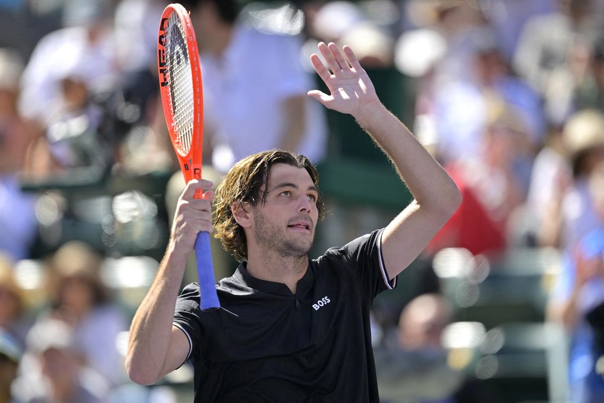 Taylor Fritz of the United States acknowledges the crowd after defeating Italy's Matteo Gigante Jayne