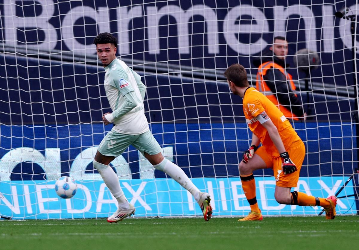 Justin Njinmah celebrates scoring Werder Bremen's second goal in the Bundesliga match against Bayer Leverkusen at BayArena, Leverkusen, Germany.