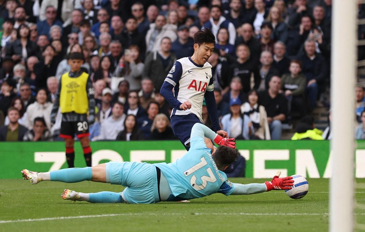 AFC Bournemouth's goalkeeper Kepa Arrizabalaga fouls Tottenham Hotspur's Son Heung-min and concedes a penalty during the match at Tottenham Hotspur Stadium, London.