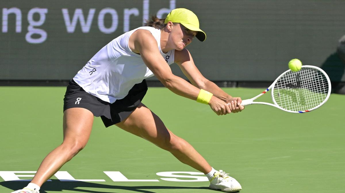 Poland's Iga Swiatek makes a backhand return against Ukraine's Dayana Yastremska in the third round of the BNP Paribas Open at the Indian Well Tennis Garden, CA, USA, on Sunday.