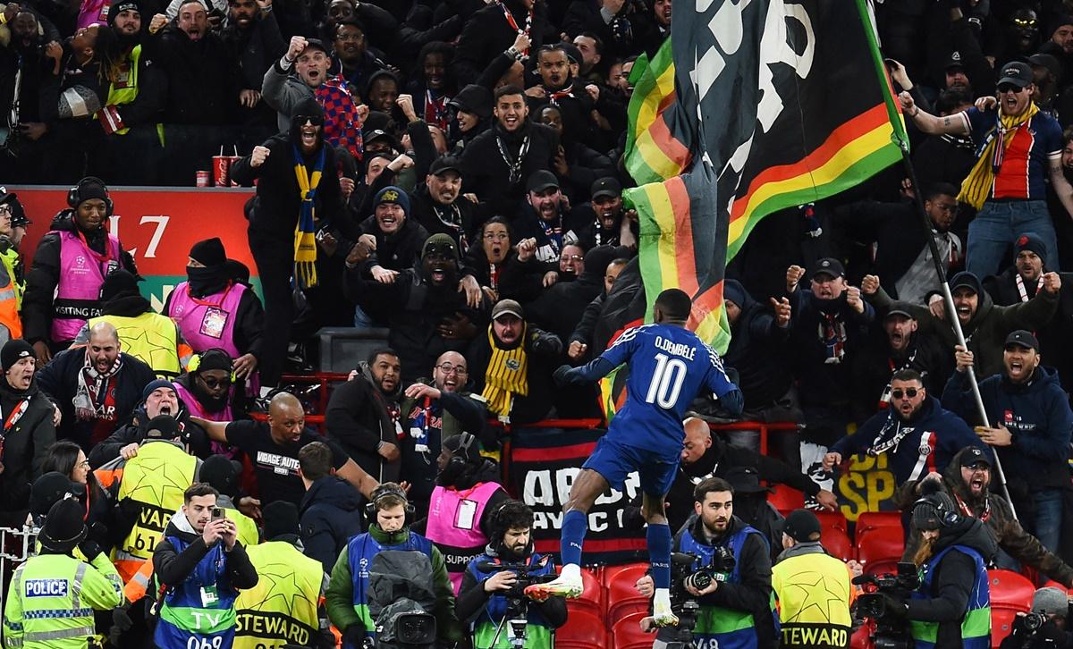 Ousmane Dembele celebrates scoring for Paris St Germain early in the first half .