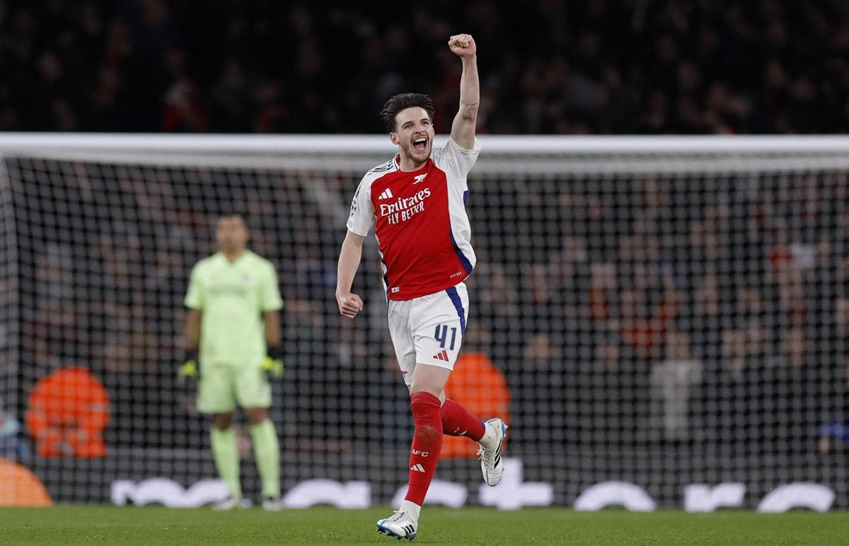 Declan Rice celebrates scoring Arsenal's second goal against PSV Eindhoven at Emirates Stadium, London.