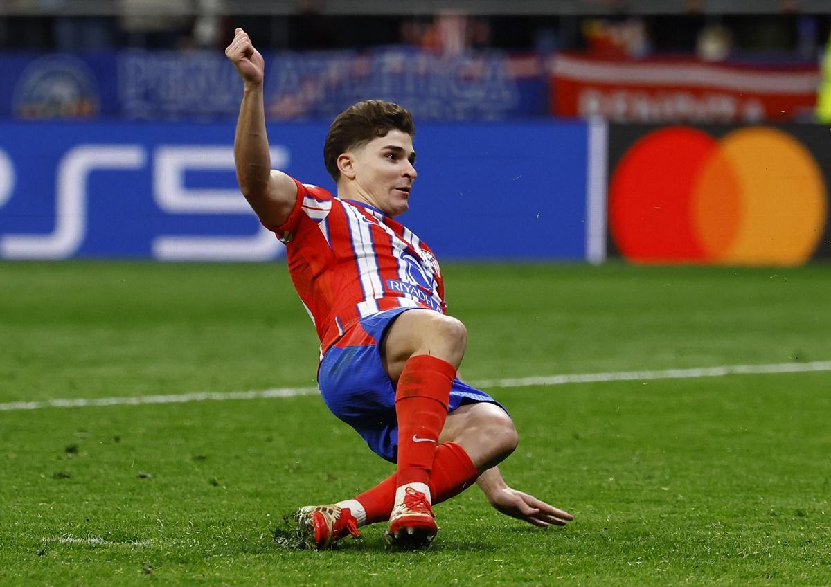 Atletico Madrid's Julian Alvarez scores during the penalty shoot-out but his goal was disallowed as he slipped and his left foot slightly touched the ball before he kicked it with his right foot, making it two touches and invalidating a strike.