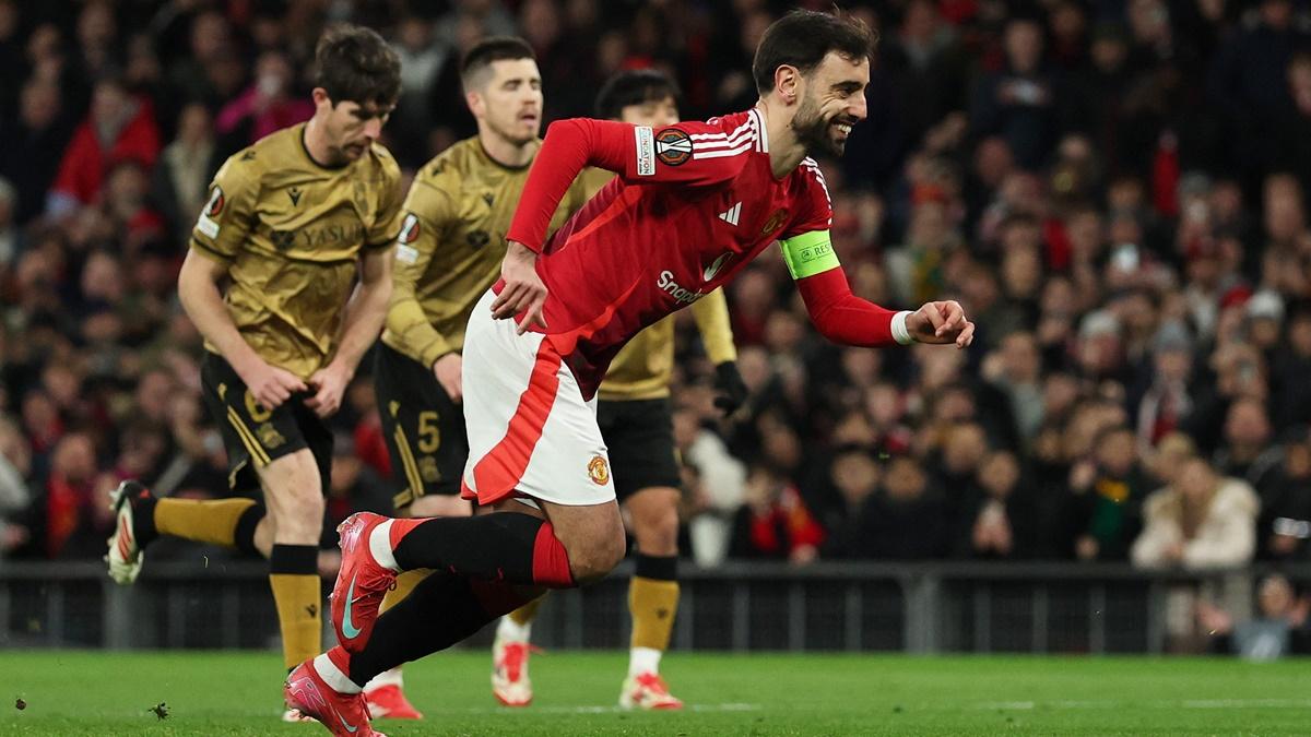 Bruno Fernandes celebrates scoring Manchester United's first goal in the Europa League Round of 16 second leg match against Real Sociedad at  Old Trafford, Manchester, on Thursday.