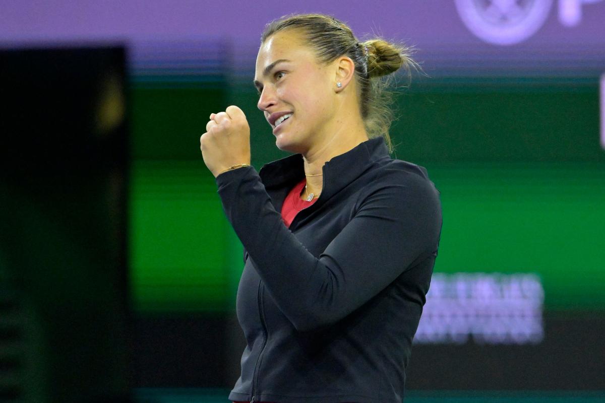 Belarusian Aryna Sabalenka reacts at match point as she defeated Madison Keys (not pictured) in the semifinal match