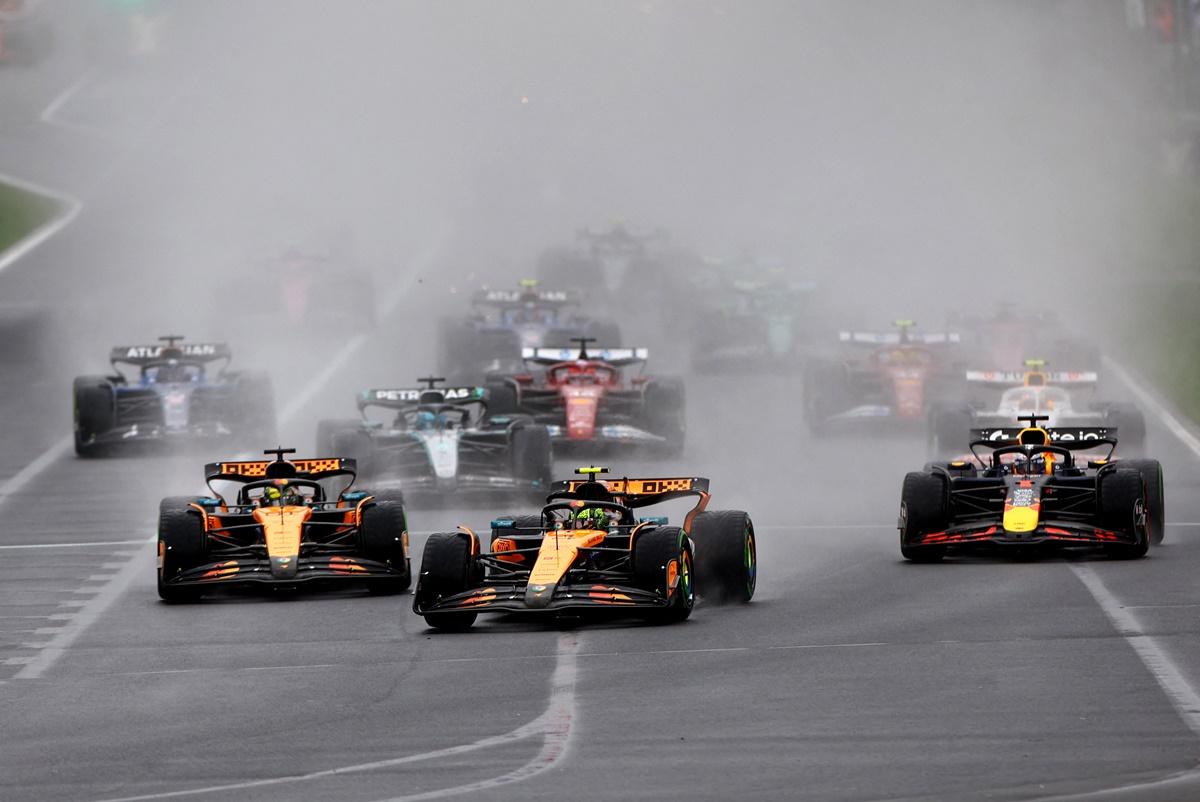 McLaren's Lando Norris and Oscar Piastri, Red Bull's Max Verstappen and other drivers at the start of the race.