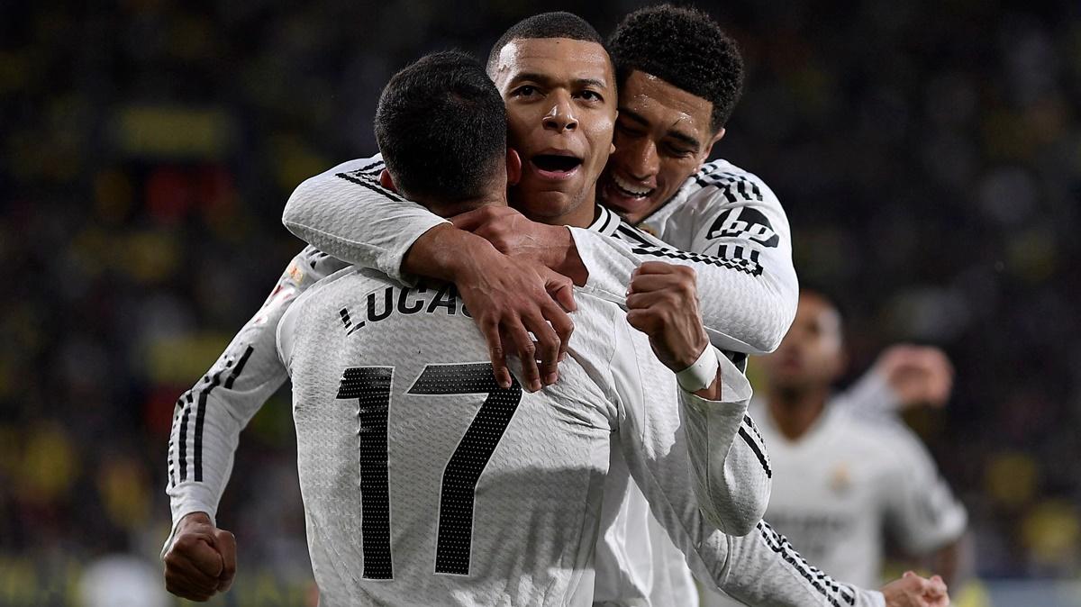 Kylian Mbappe celebrates scoring Real Madrid's second goal with Lucas Vazquez and Jude Bellingham during the LaLiga match against Villarreal at Estadio de la Ceramica, Villarreal, on Saturday.