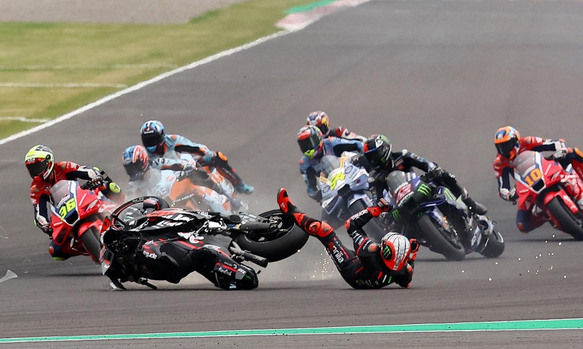 Aprilia Racing's Marco Bezzecchi crashes out of the race.