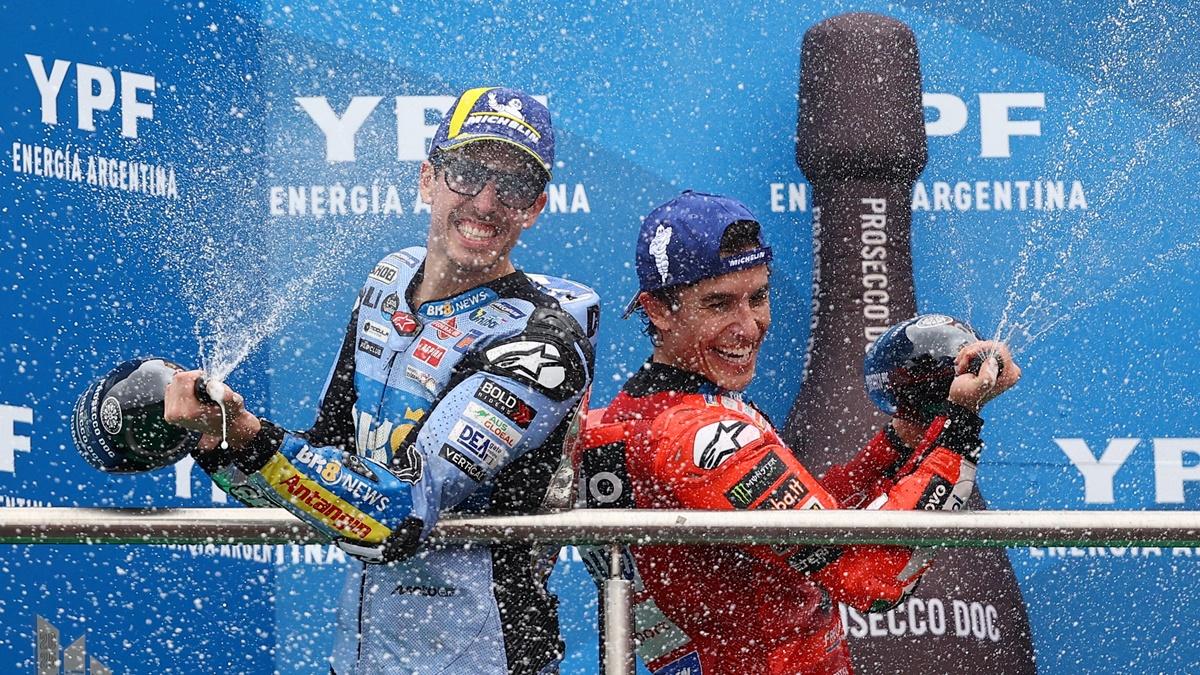 Ducati Lenovo Team's Marc Marquez and BK8 Gresini Racing Alex Marquez celebrate with champagne on the podium after finishing first and second respectively in the MotoGP  Argentina Grand Prix, at Autodromo Termas de Rio Hondo, Santiago del Estero, on Sunday.