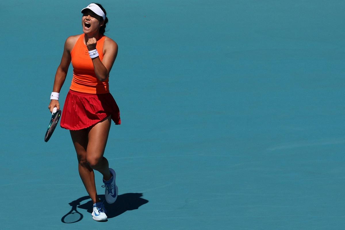 Britain's Emma Raducanu reacts after winning the first set against Emma Navarro of the United States.