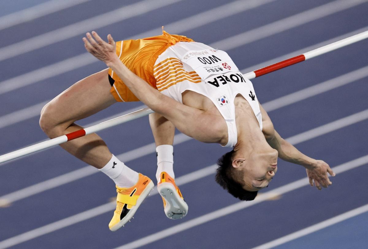 South Korea's Woo Sang-hyeok clears 2.31 metres during the men's High Jump final.