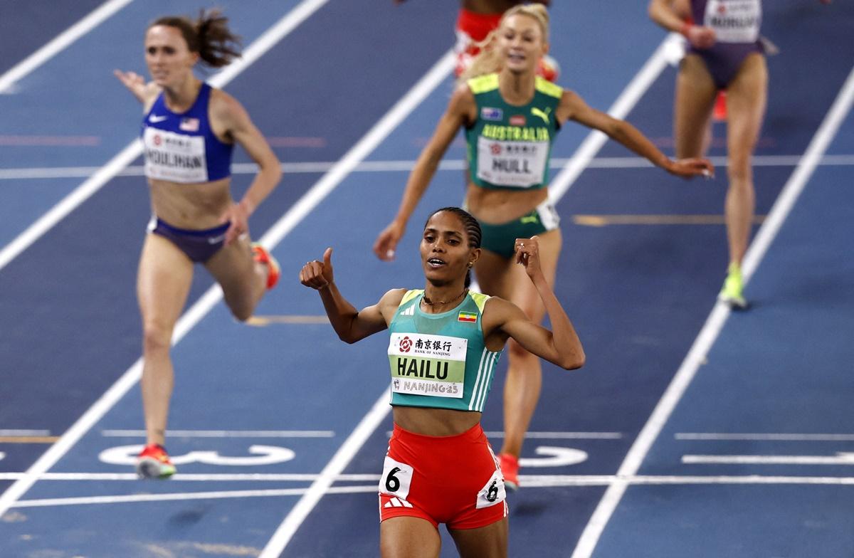 Ethiopia's Freweyni Hailu crosses the line to win the women's 3000m final.