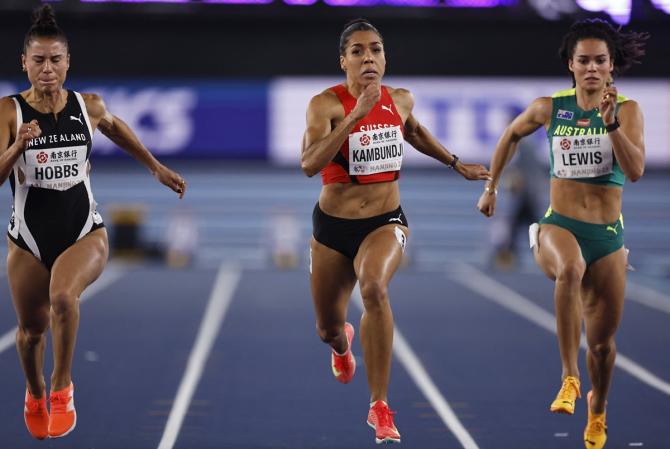 Switzerland's Mujinga Kambundji got the better of Italy's Zaynab Dosso and Patrizia van der Weken of Luxembourg to win the women's 60 metres final.