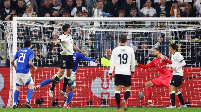 Tim Kleindienst scores Germany's third goal.