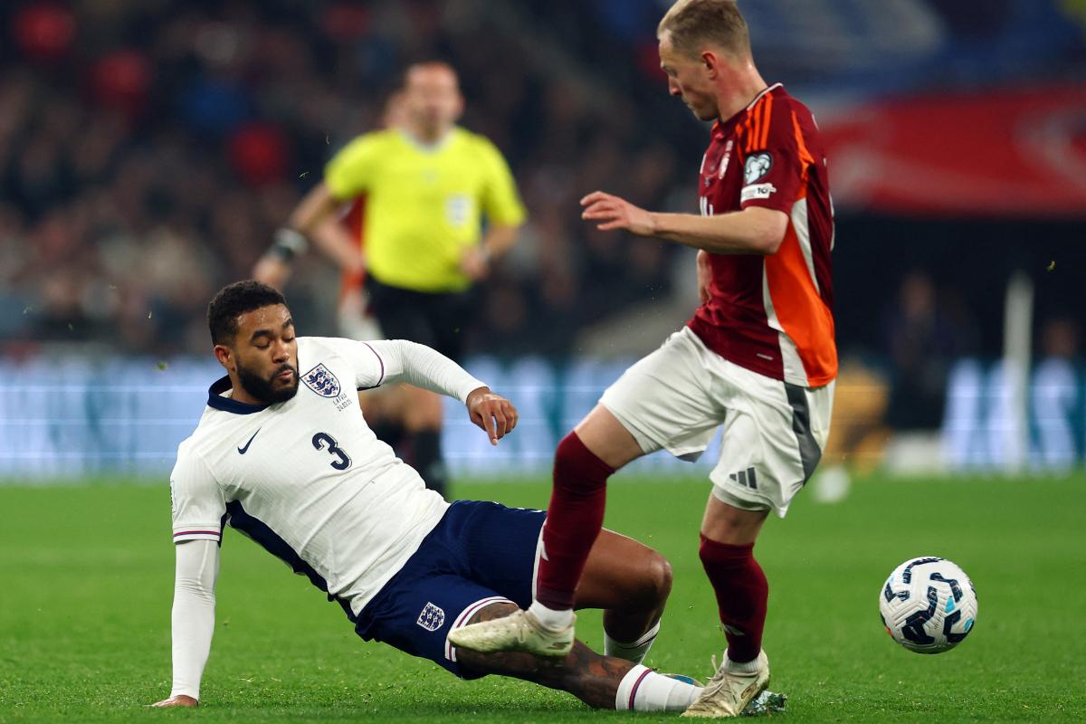 England's Reece James in action with Latvia's Andrej Ciganiks 