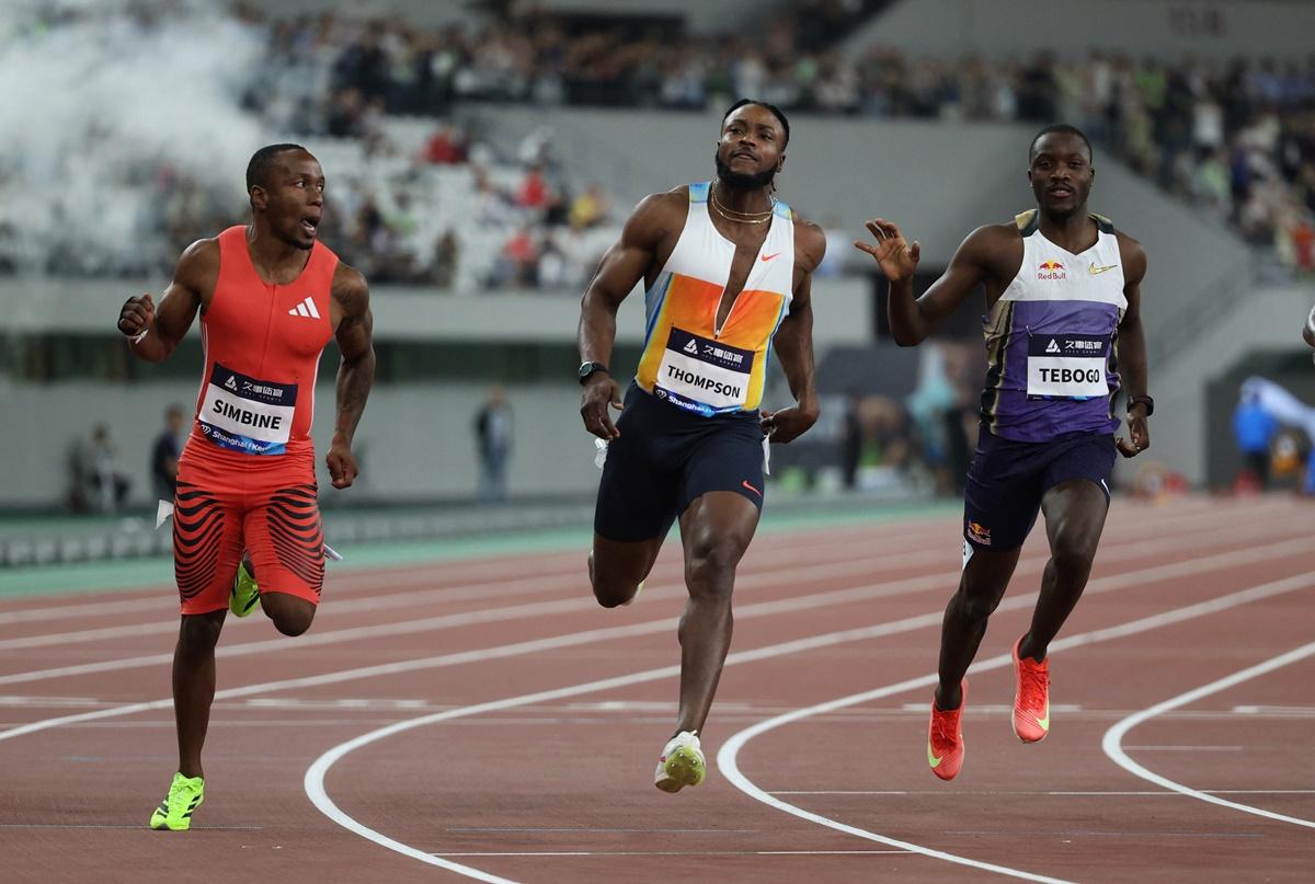 South Africa's Akani Simbine, Jamaica's Kishane Thompson and Botswana's Letsile Tebogo in action during the men's 100m final.