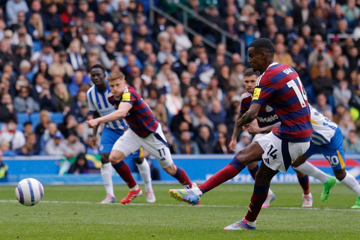 Newcastle United's Alexander Isak scores their first goal from the penalty spot in the match against Brighton & Hove Albion  at The American Express Community Stadium, Brighton 