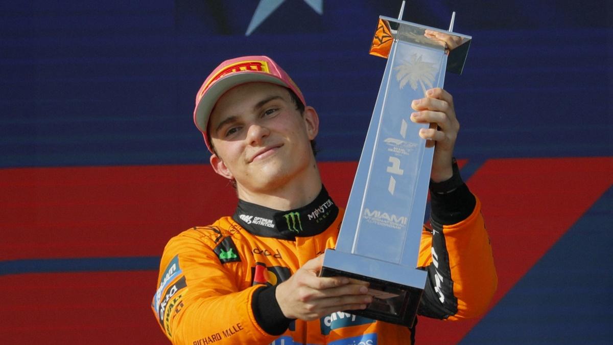 McLaren's Oscar Piastri celebrates with the trophy on the podium after winning the Miami Formula One Grand Prix, at Miami International Autodrome, Miami, Florida, on Sunday.