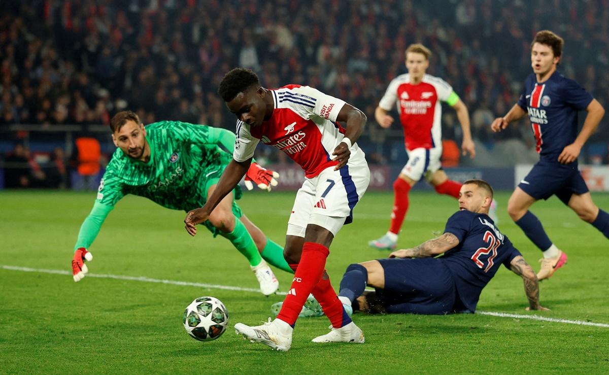 Bukayo Saka pulls a goal back for Arsenal.