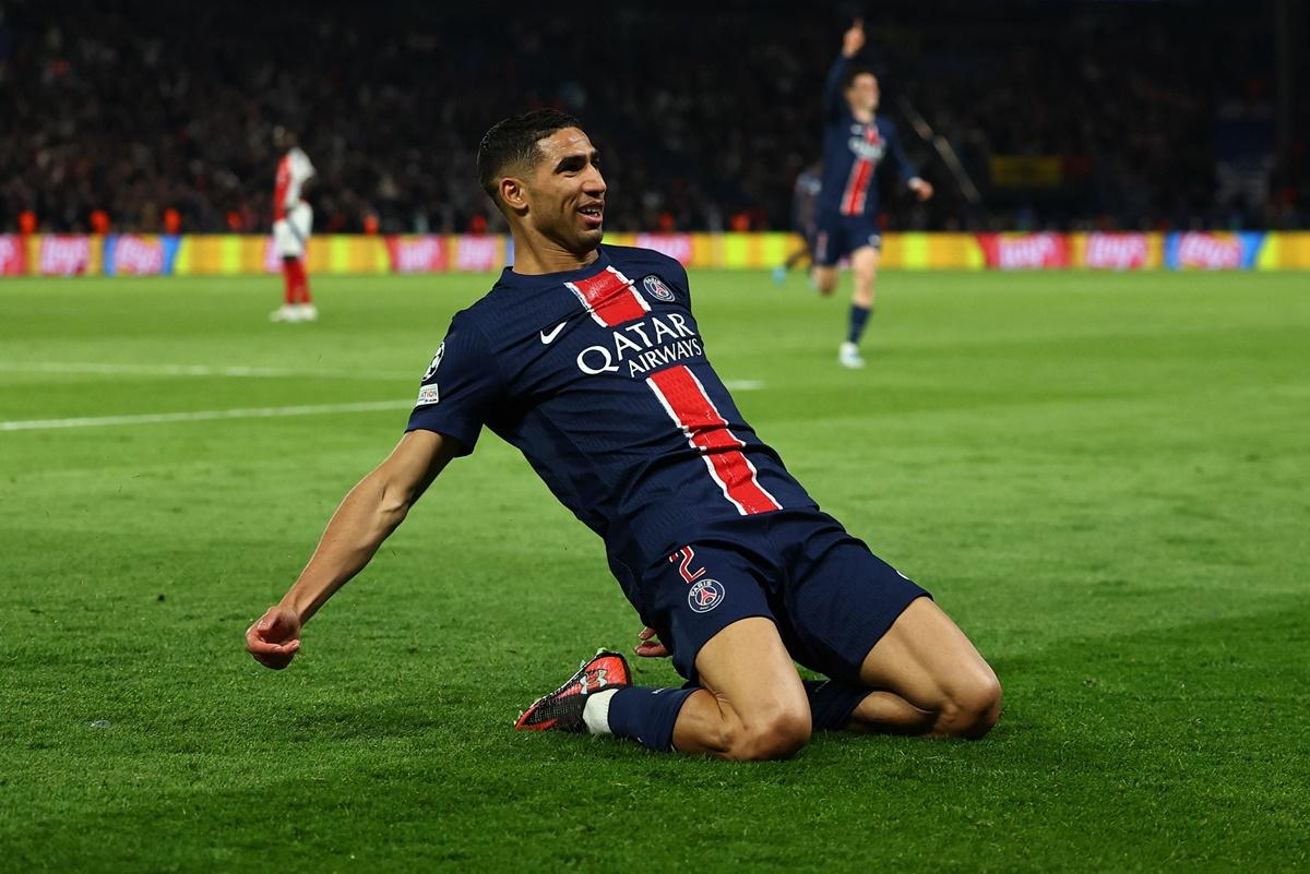 Achraf Hakimi celebrates scoring PSG's second goal.