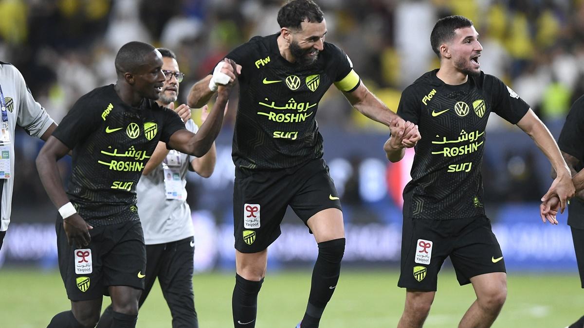 Al Ittihad's Houssem Aouar, Karim Benzema and Moussa Diaby celebrate after the match.