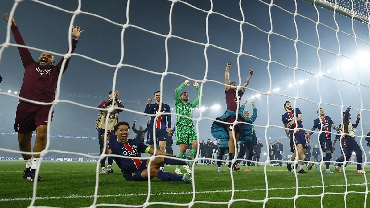 Paris St Germain players celebrate after the match.