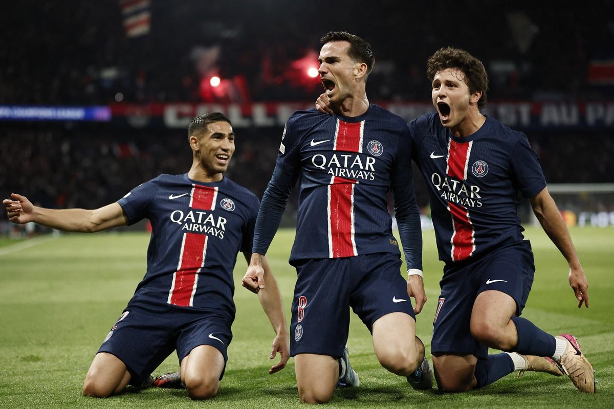 Fabian Ruiz celebrates scoring with PSG teammates Achraf Hakimi and Joao Neves.