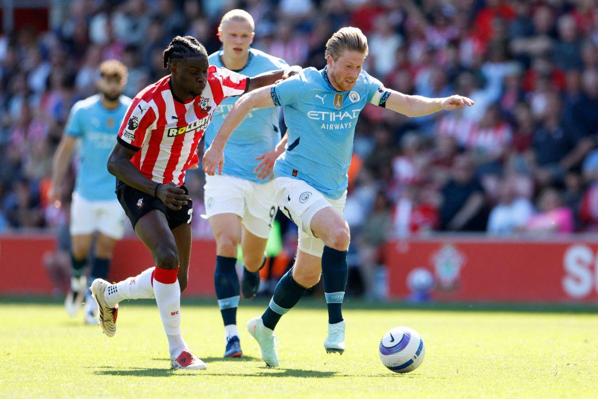 Southampton's Lesley Ugochukwu challenges Manchester City's Kevin De Bruyne at St Mary's Stadium, Southampton